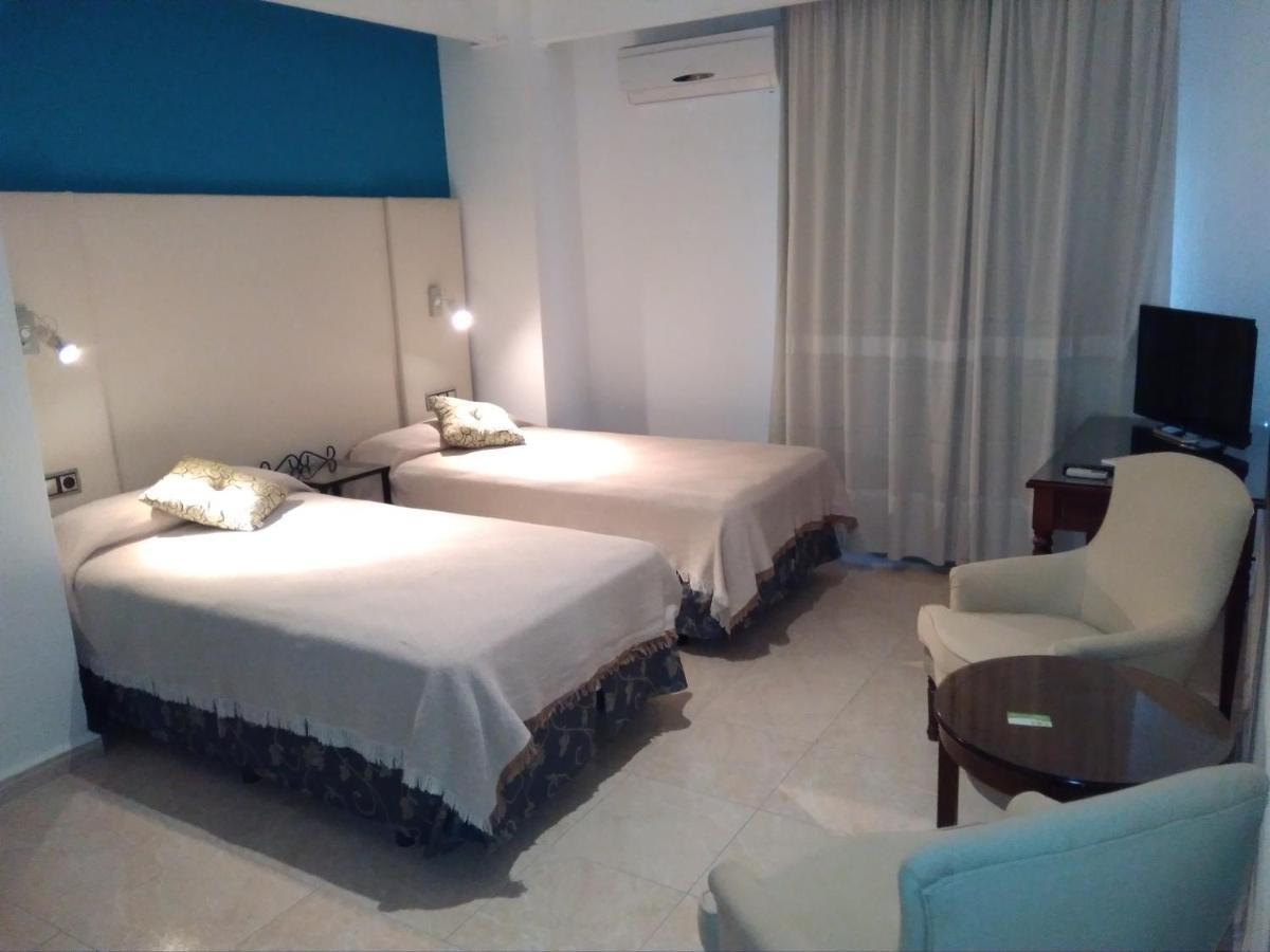 Hotel Nuevo Ara Caces Стая снимка